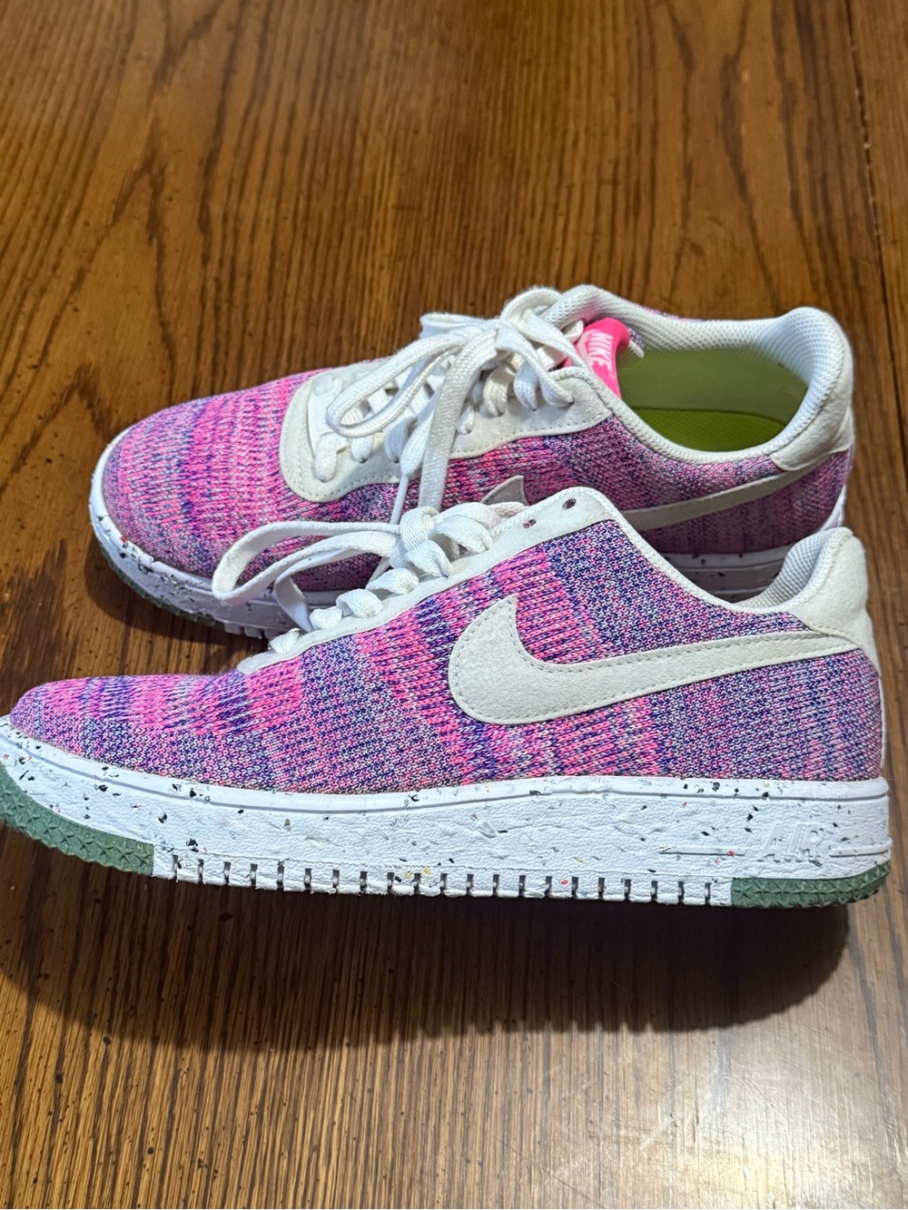 Nike Women’s Pink Knit Low-Top Sneakers with White Swoosh